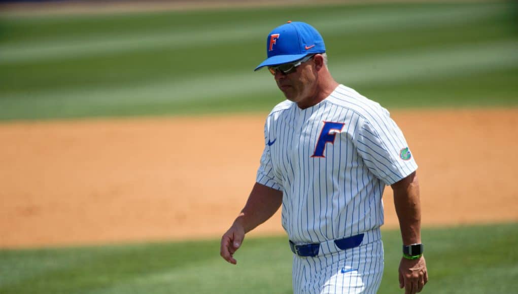University of Florida manager Kevin O’Sullivan walks back to the dugout after meeting with Christian Scott- Florida Gators baseball -1280x853
