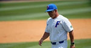 University of Florida manager Kevin O’Sullivan walks back to the dugout after meeting with Christian Scott- Florida Gators baseball -1280x853