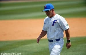 University of Florida manager Kevin O’Sullivan walks back to the dugout after meeting with Christian Scott- Florida Gators baseball -1280x853