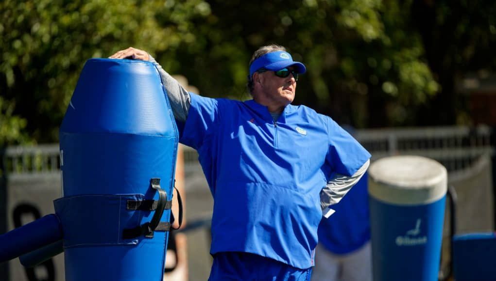 University of Florida defensive coordinator watches as the Florida Gators go through practice in spring camp— Florida Gators football— 1280x854