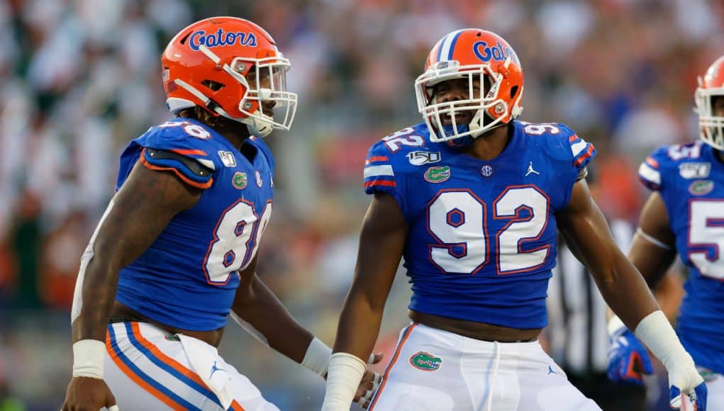 University of Florida defensive linemen Jabari Zuniga and Adam Shuler celebrate one of Florida’s 11 sacks against Miami- Florida Gators football- 1280x853