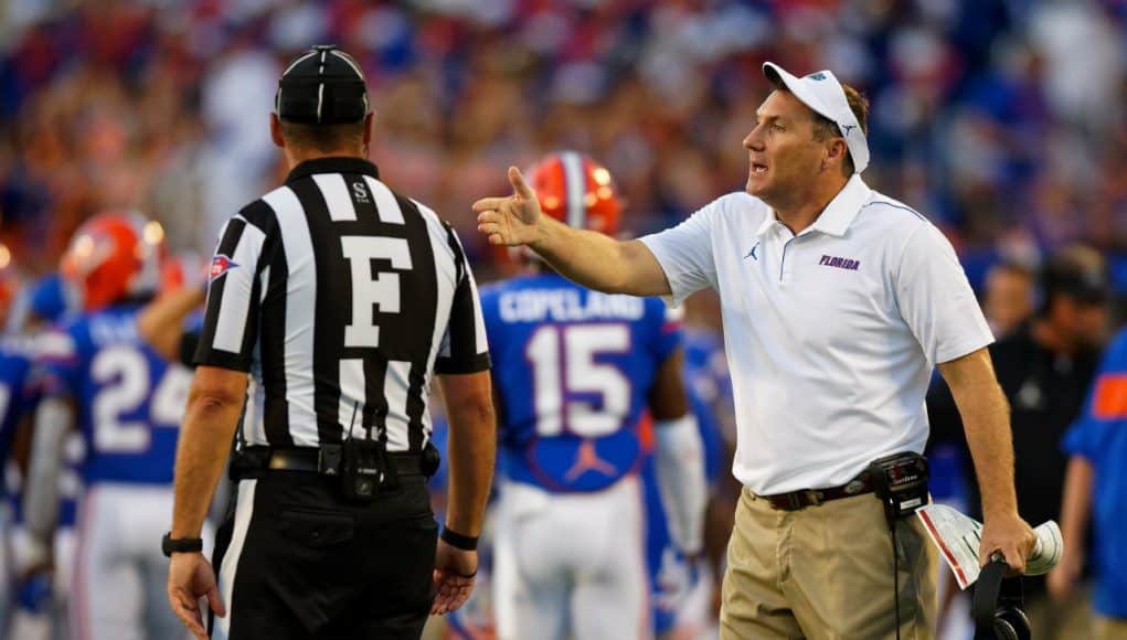 University of Florida head coach Dan Mullen talking to a Big 12 referee during the Florida Gators 24-20 win over Miami- Florida Gators football- 1280x853