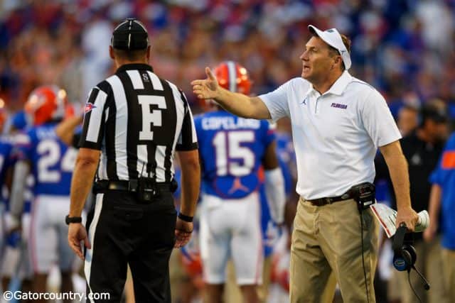 University of Florida head coach Dan Mullen talking to a Big 12 referee during the Florida Gators 24-20 win over Miami- Florida Gators football- 1280x853