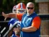 University of Florida offensive line coach John Hevesy teaching before a drill in spring camp- Florida Gators football- 1280x853