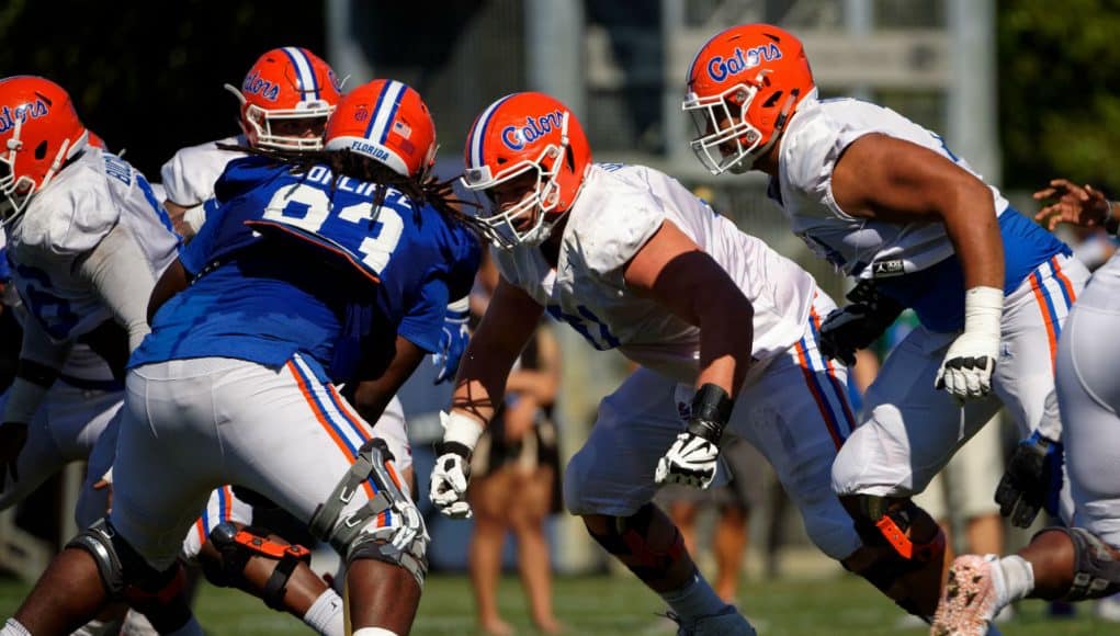 University of Florida offensive lineman Brett Heggie going through drills during spring football practice- Florida Gators football- 1280x853