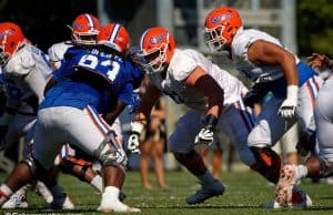 University of Florida offensive lineman Brett Heggie going through drills during spring football practice- Florida Gators football- 1280x853