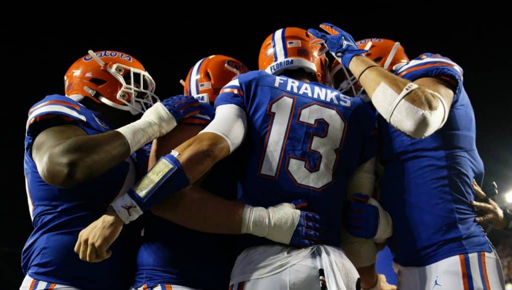 University of Florida quarterback Feleipe Franks celebrates with teammates after scoring a touchdown to put Florida up 24-20 over Miami- Florida Gators football-1280x853