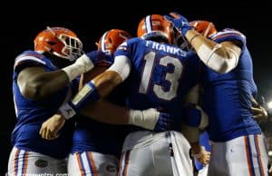 University of Florida quarterback Feleipe Franks celebrates with teammates after scoring a touchdown to put Florida up 24-20 over Miami- Florida Gators football-1280x853