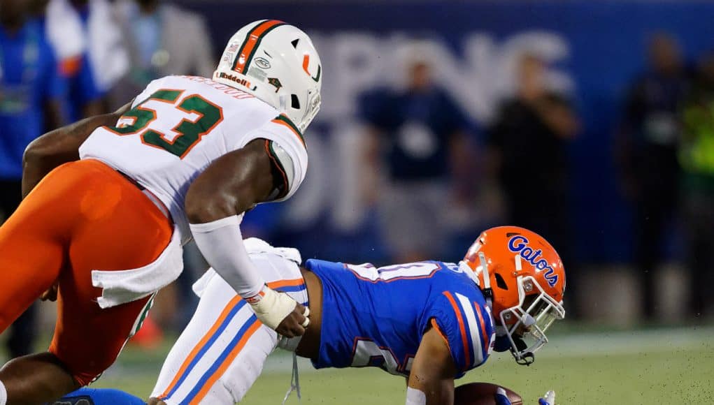 University of Florida running back Malik Davis falls down on a fumble in the second quarter against Miami- Florida Gators football- 1280x853