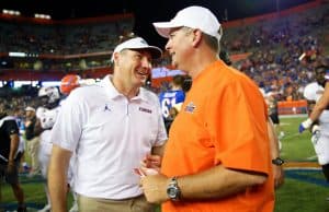 Florida Gators head coach Dan Mullen and UT Martin Skyhawks head coach Jason Simpson post-game handshake- Florida Gators football- 1280x852