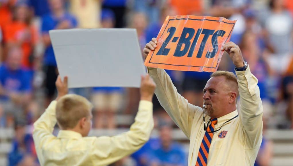 George Edmondson’s grandchildren lead Ben Hill Griffin in the Mr. Two Bits cheer in before the Gators’ game against UT Martin in honor of their grandfather- Florida Gators football- 1280x853