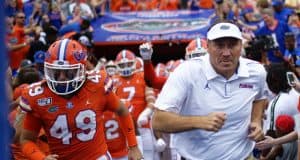 University of Florida head coach Dan Mullen leads the Florida Gators on to the field to take on the Towson Tigers- Florida Gators football- 1280x853