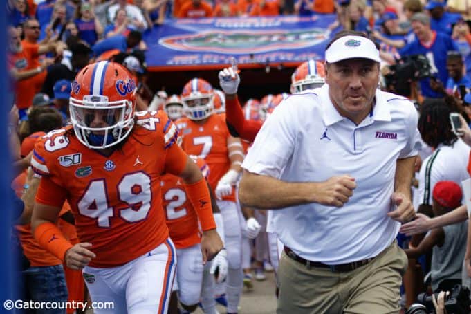 University of Florida head coach Dan Mullen leads the Florida Gators on to the field to take on the Towson Tigers- Florida Gators football- 1280x853