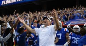 Florida Gators head coach Dan Mullen enters the Swamp before the Auburn game- 1280x853