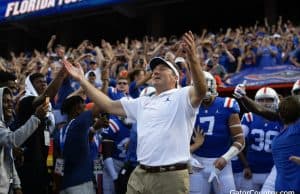 Florida Gators head coach Dan Mullen enters the Swamp before the Auburn game- 1280x853