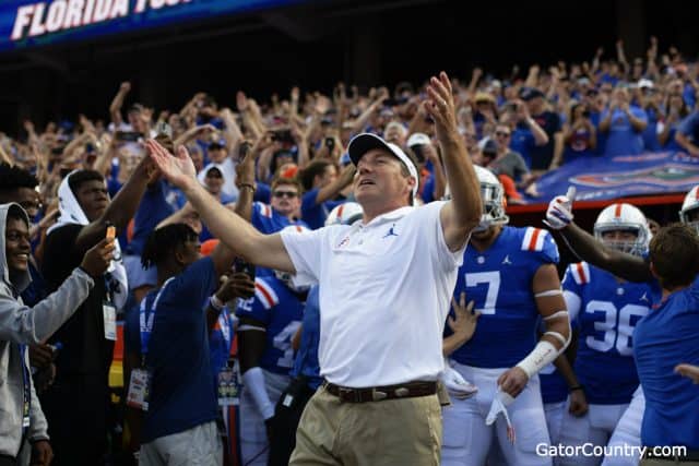 Florida Gators head coach Dan Mullen enters the Swamp before the Auburn game- 1280x853