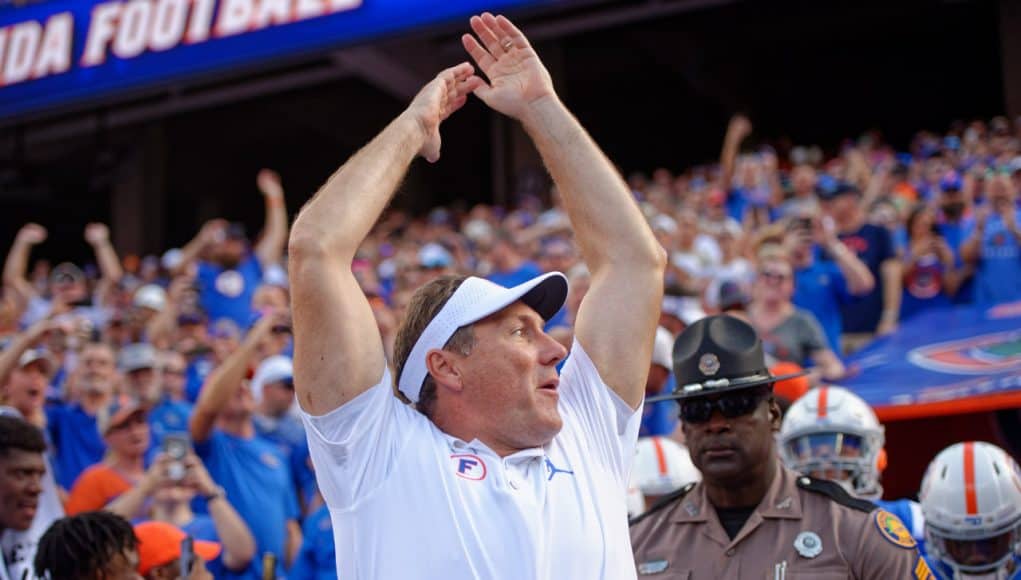 Florida Gators head coach Dan Mullen pumps the crowd before the Auburn game-1280x852