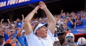 Florida Gators head coach Dan Mullen pumps the crowd before the Auburn game-1280x852