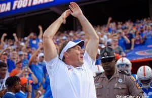 Florida Gators head coach Dan Mullen pumps the crowd before the Auburn game-1280x852