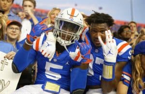 University of Florida freshmen Kaiir Elam and Khris Bogle celebrate with fans after the Gators win over Auburn in 2019- Florida Gators football- 1280x853