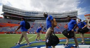 Podcast: Previewing Florida Gators vs Auburn with Tom Green University of Florida players cross midfield during Gator walk before playing the Towson Tigers- Florida Gators football- 1280x853