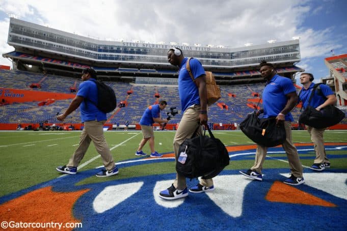 University of Florida players cross midfield during Gator walk before playing the Towson Tigers- Florida Gators football- 1280x853