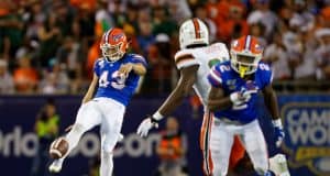 University of Florida punter Tommy Townsend punts the ball in the 2019 season opener against the Miami Hurricanes- Florida Gators football- 1280x853