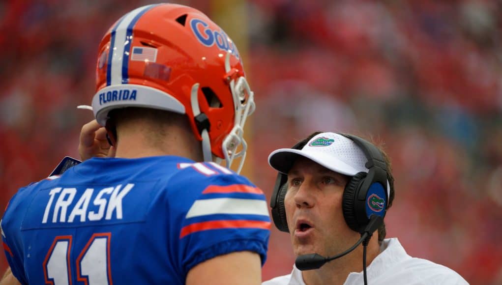 Florida Gators quarterback Kyle Trask talks to Dan Mullen during the UGA game- 1280x853