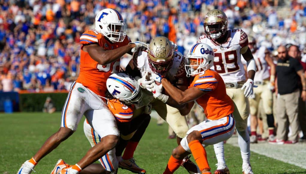 University of Florida Gators defensive back Shawn Davis cornerback Marco Wilson combine for a tackle in a loss to FSU- Florida Gators football- 1280x853