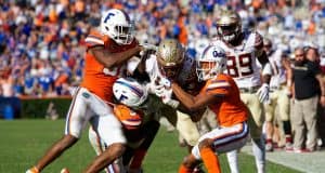University of Florida Gators defensive back Shawn Davis cornerback Marco Wilson combine for a tackle in a loss to FSU- Florida Gators football- 1280x853