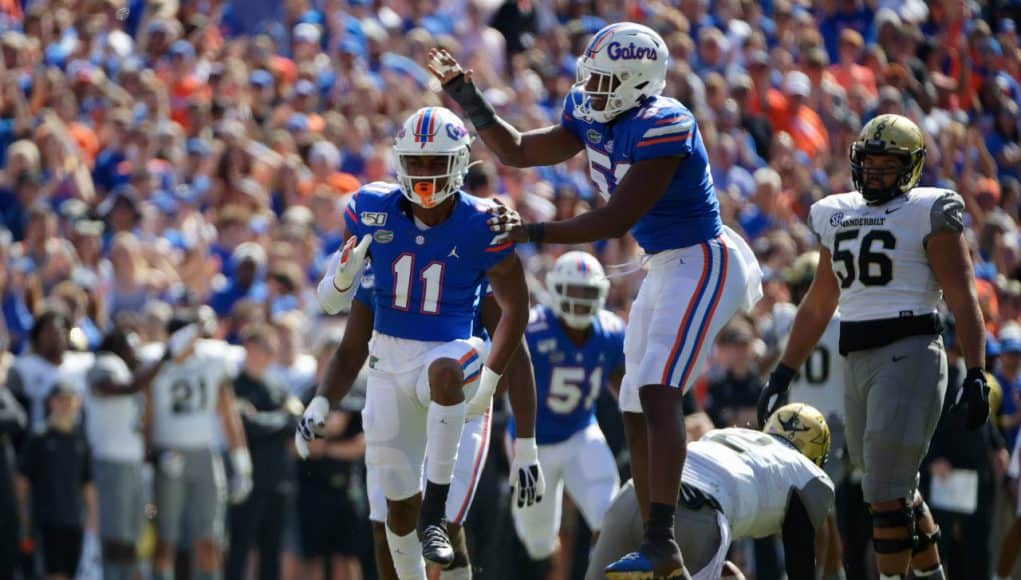 University of Florida defensive linemen Mohamoud Diabate and Jon Greenard celebrate Diabate’s first of two sacks against Vanderbilt- Florida Gators football- 1280x853