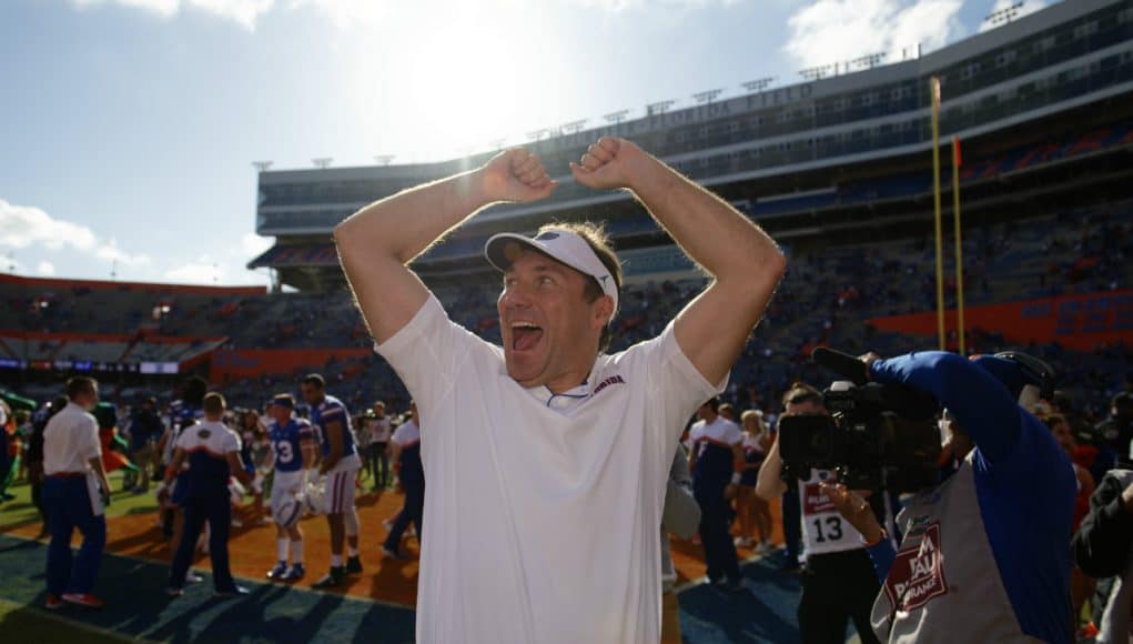 University of Florida head coach Dan Mullen celebrates with fans after the Florida Gators 56-0 win over Vanderbilt- Florida Gators football- 1280x853