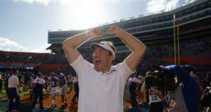 University of Florida head coach Dan Mullen celebrates with fans after the Florida Gators 56-0 win over Vanderbilt- Florida Gators football- 1280x853