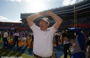 University of Florida head coach Dan Mullen celebrates with fans after the Florida Gators 56-0 win over Vanderbilt- Florida Gators football- 1280x853