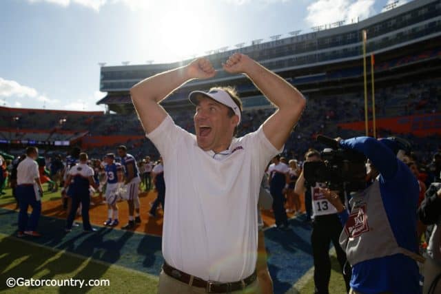 University of Florida head coach Dan Mullen celebrates with fans after the Florida Gators 56-0 win over Vanderbilt- Florida Gators football- 1280x853