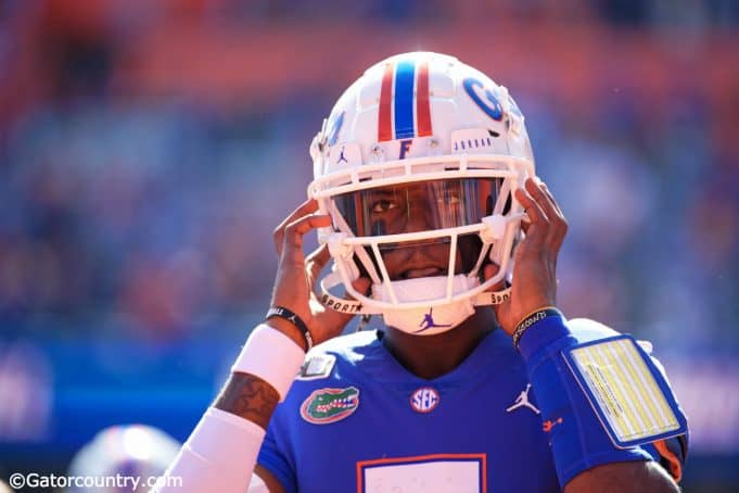 University of Florida quarterback Emory Jones puts his helmet on before entering the game against Vanderbilt- Florida Gators football- 1280x853