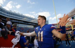 University of Florida quarterback Kyle Trask greets fans as he leaves the field following Florida’s 56-0 win over Vanderbilt- Florida Gators football- 1280x853