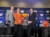 Head coaches Bronco Mendenhall and Dan Mullen pose with Orange Bowl committee president José Romano and the Orange Bowl trophy- Florida Gators football- 1280x960