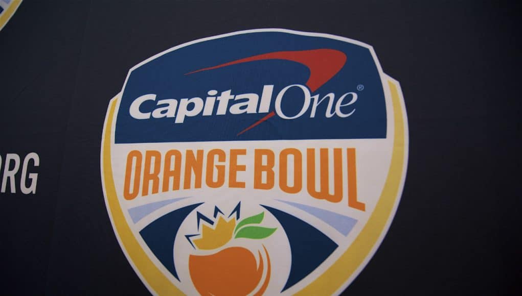 The Orange Bowl logo on a backdrop before the Florida Gators football team is interviewed before the 2019 Orange bowl- Florida Gators football- 1280x854