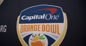 The Orange Bowl logo on a backdrop before the Florida Gators football team is interviewed before the 2019 Orange bowl- Florida Gators football- 1280x854