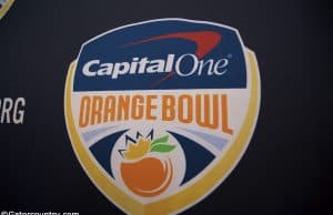 The Orange Bowl logo on a backdrop before the Florida Gators football team is interviewed before the 2019 Orange bowl- Florida Gators football- 1280x854