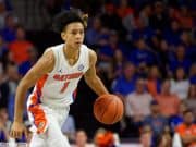 University of Florida freshman guard Tre Mann brings the ball up the court against Florida State- Florida Gators basketball- 1280x853