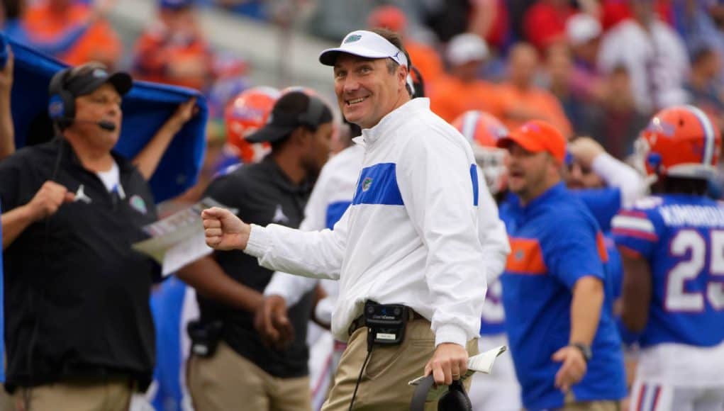University of Florida head coach Dan Mullen looks at the scoreboard during the Florida Gators’ loss to Georgia in 2019- Florida Gators football- 1280x853