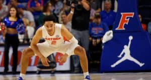University of Florida guard Andrew Nembhard stretches before tipoff against Florida State- Florida Gators basketball- 1280x853