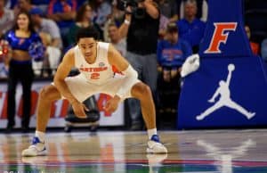 University of Florida guard Andrew Nembhard stretches before tipoff against Florida State- Florida Gators basketball- 1280x853