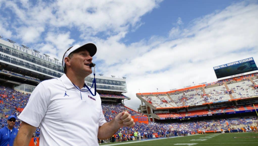 University of Florida head coach Dan Mullen walks on the field before the Florida Gators game against Tennessee in 2019- Florida Gators football- 1280x873