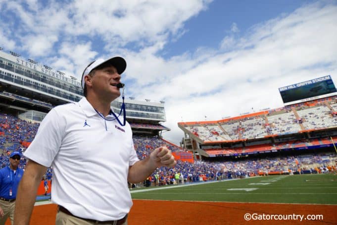 University of Florida head coach Dan Mullen walks on the field before the Florida Gators game against Tennessee in 2019- Florida Gators football- 1280x873