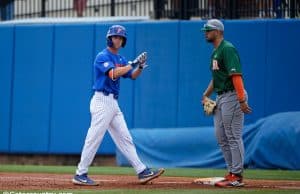 University of Florida second baseman Cory Acton looks towards the dugout after a single against Miami- Florida Gators baseball- 1280x853