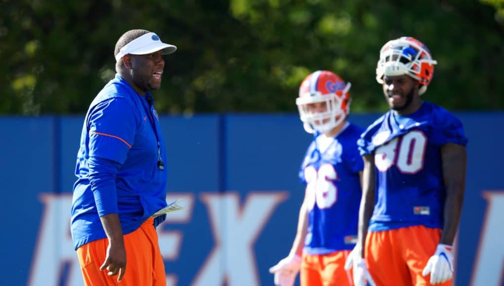 University of Florida tight ends coach Larry Scott works with his position group during spring practice- Florida Gators football- 1280x853