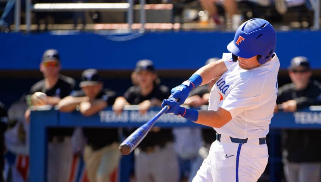 University of Florida catcher Nathan Hickey gets a hit as the Florida Gators beat Troy to complete a series sweep- Florida Gators baseball- 1280x853